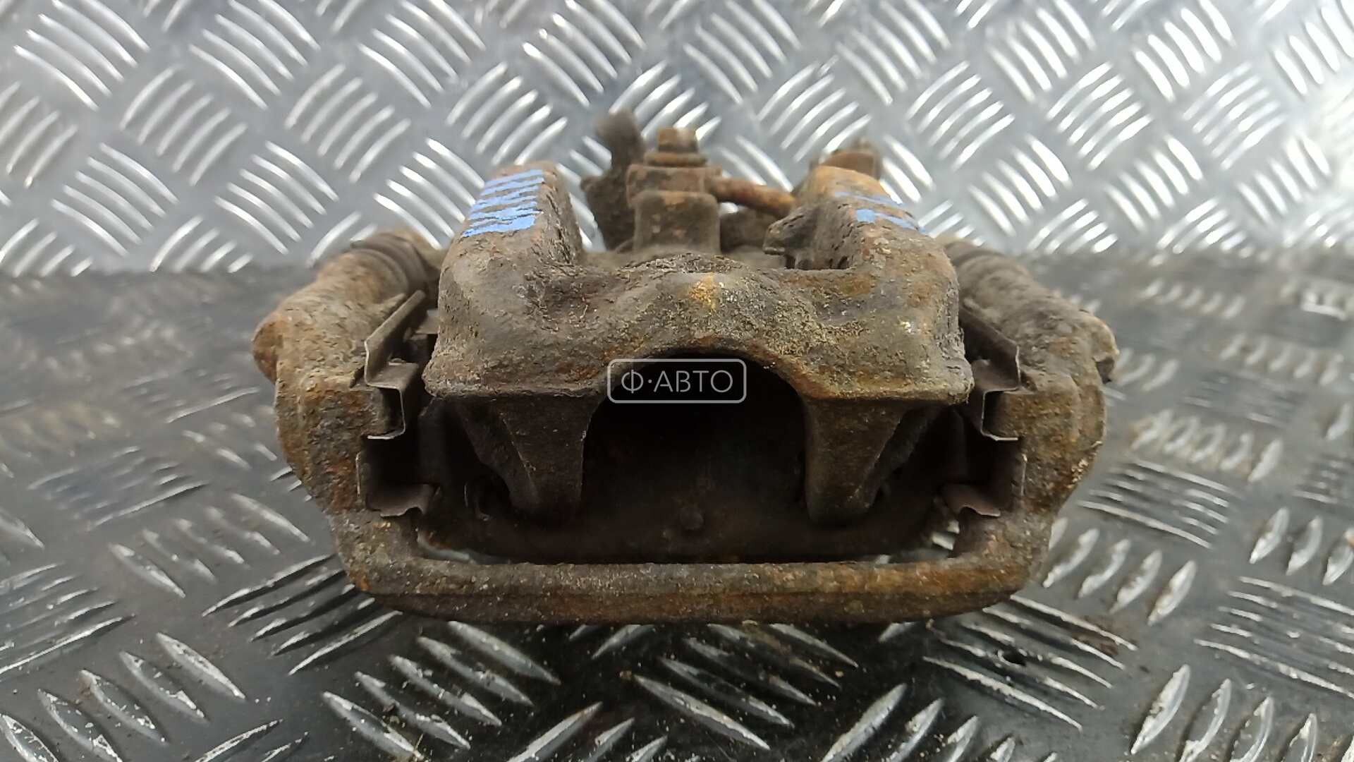 Суппорт тормозной задний левый