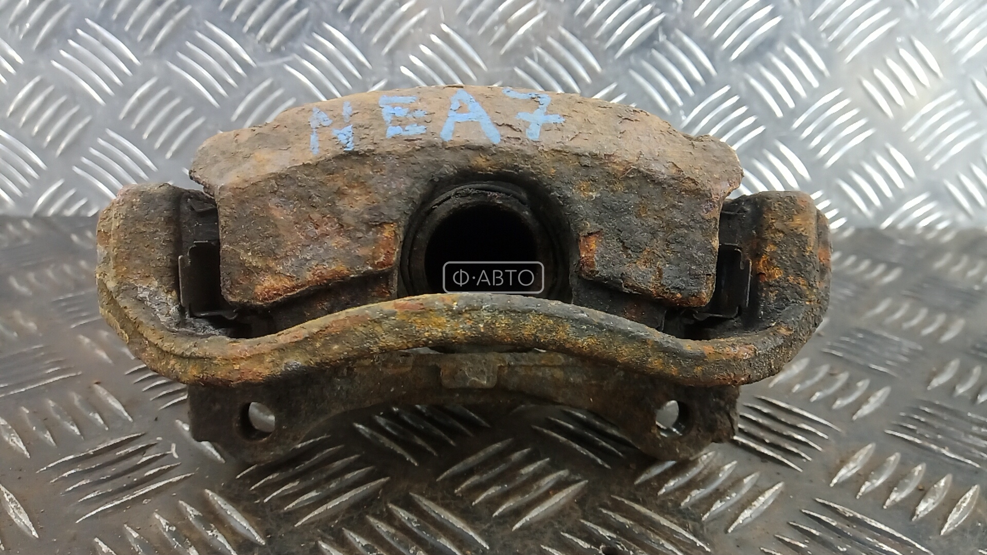 Суппорт тормозной задний левый