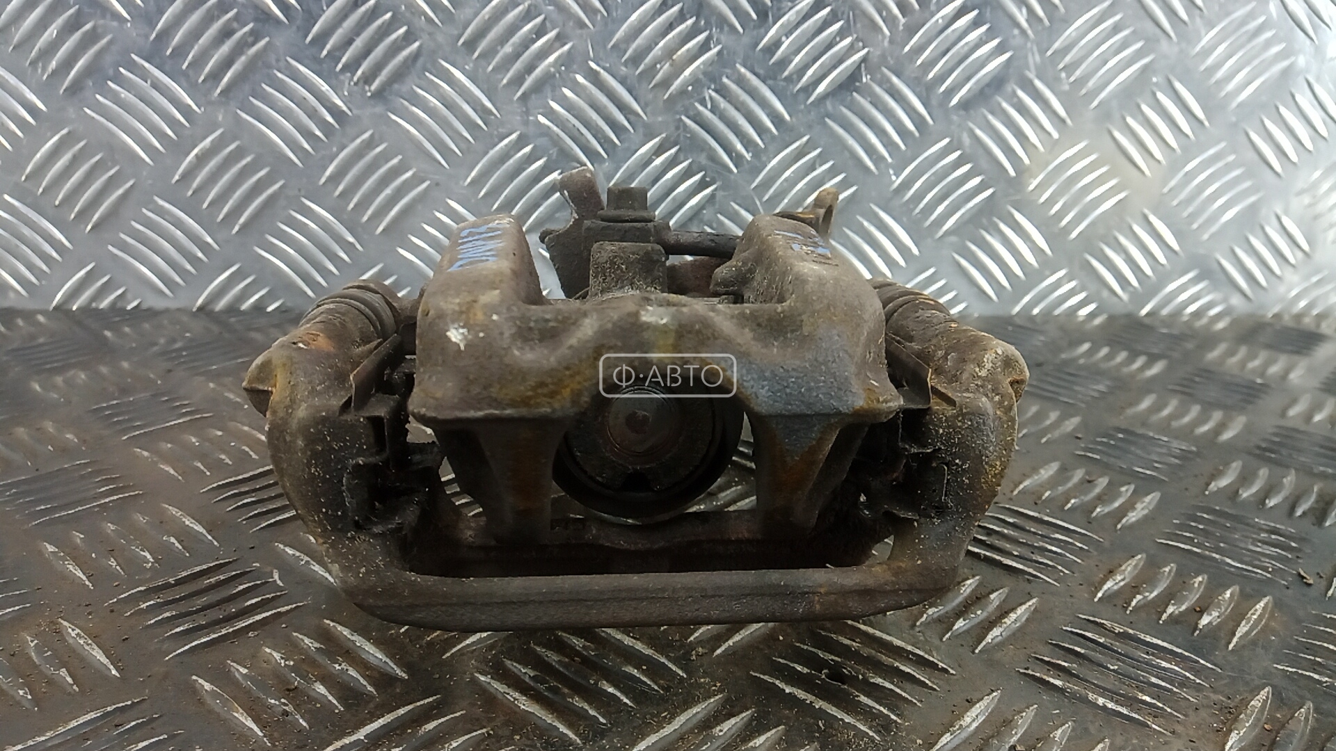 Суппорт тормозной задний левый