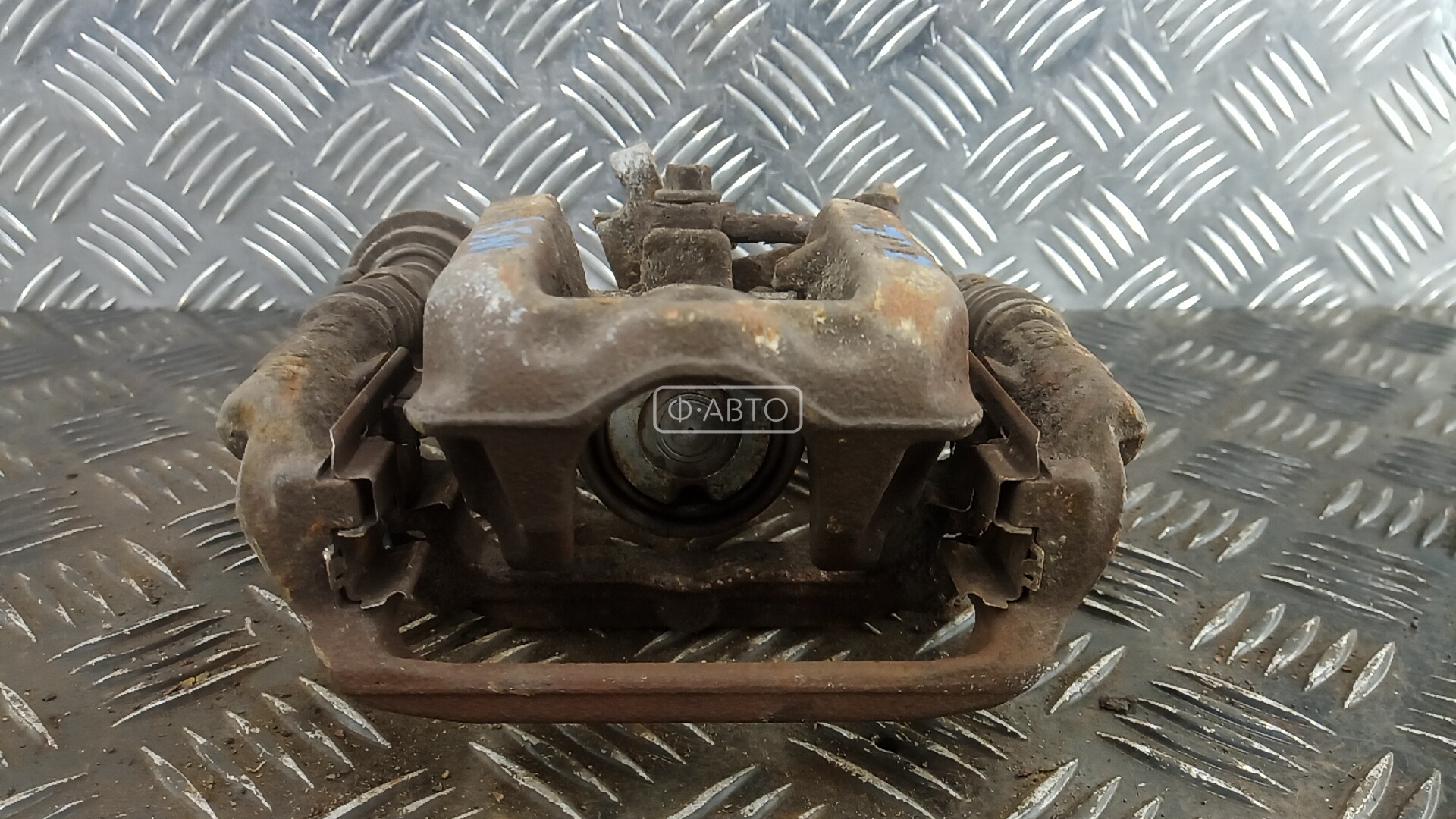 Суппорт тормозной задний левый