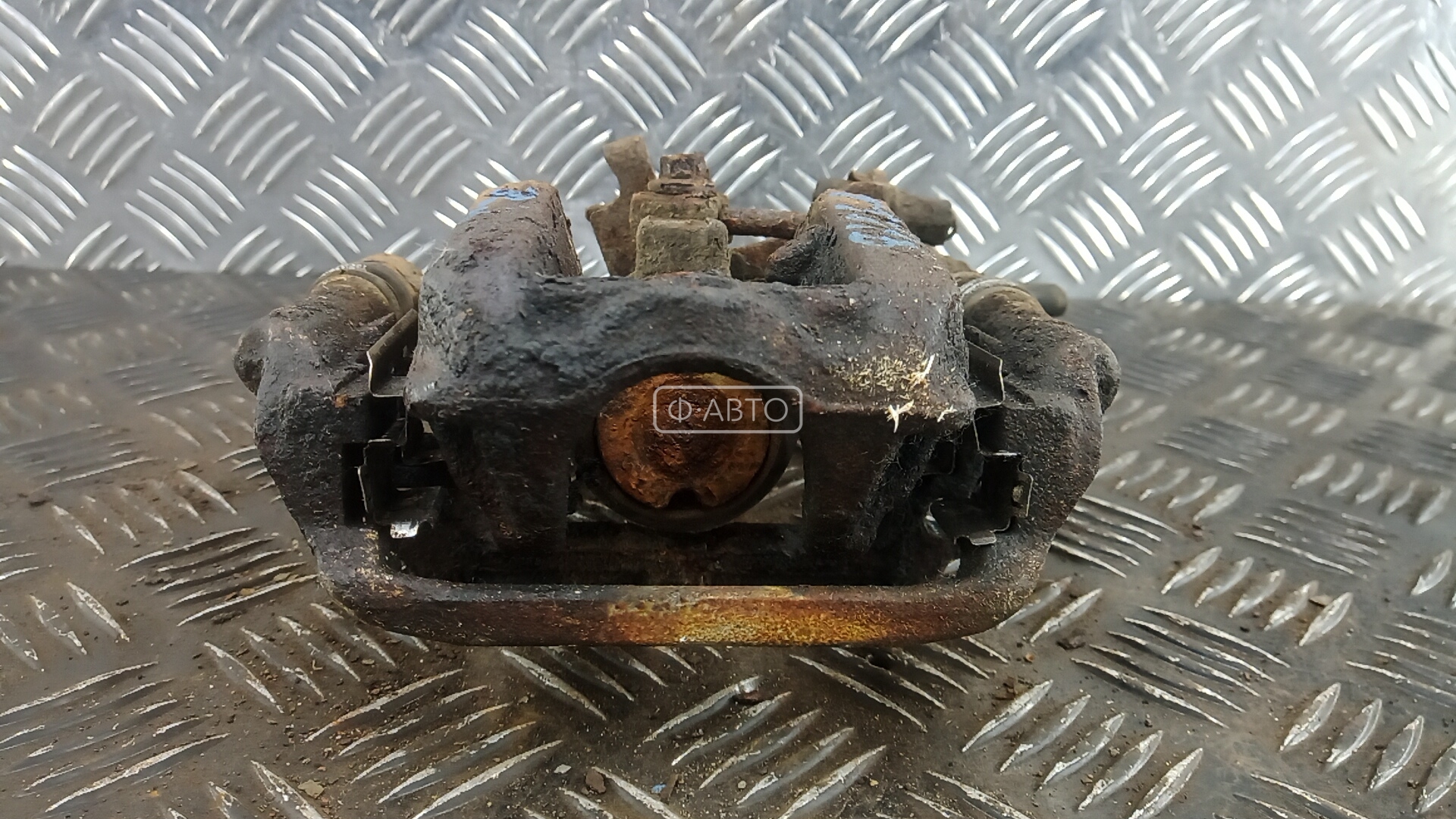 Суппорт тормозной задний левый