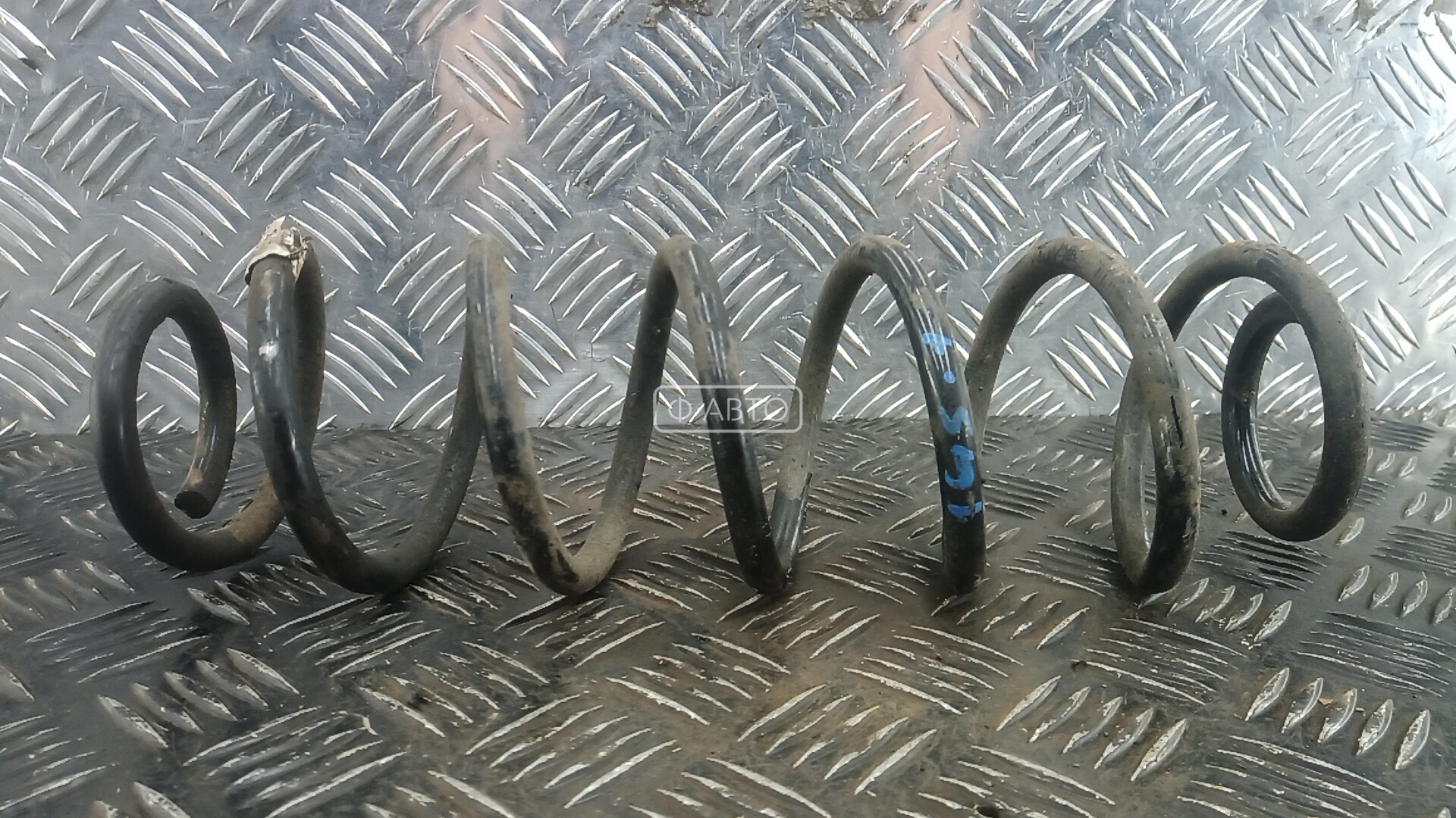 Пружина задняя