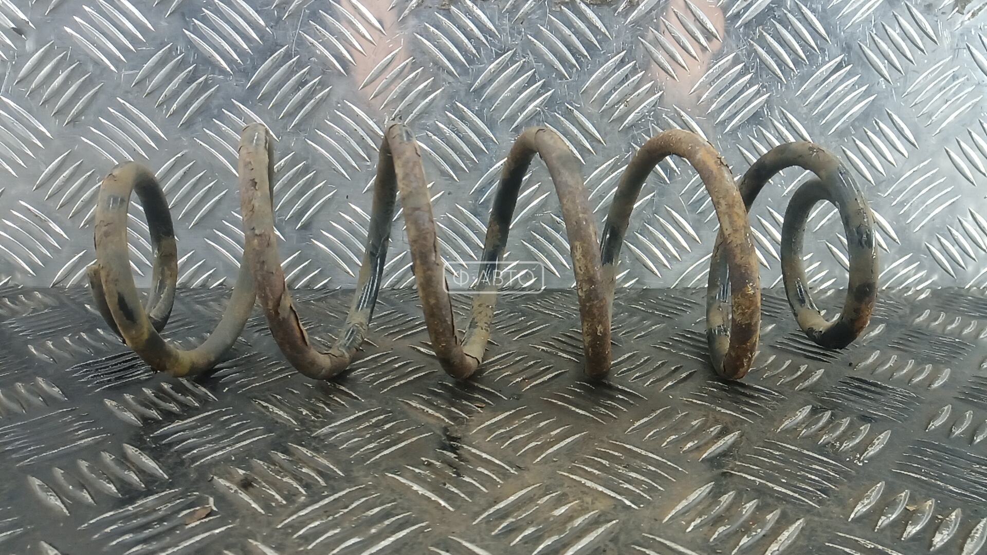 Пружина задняя