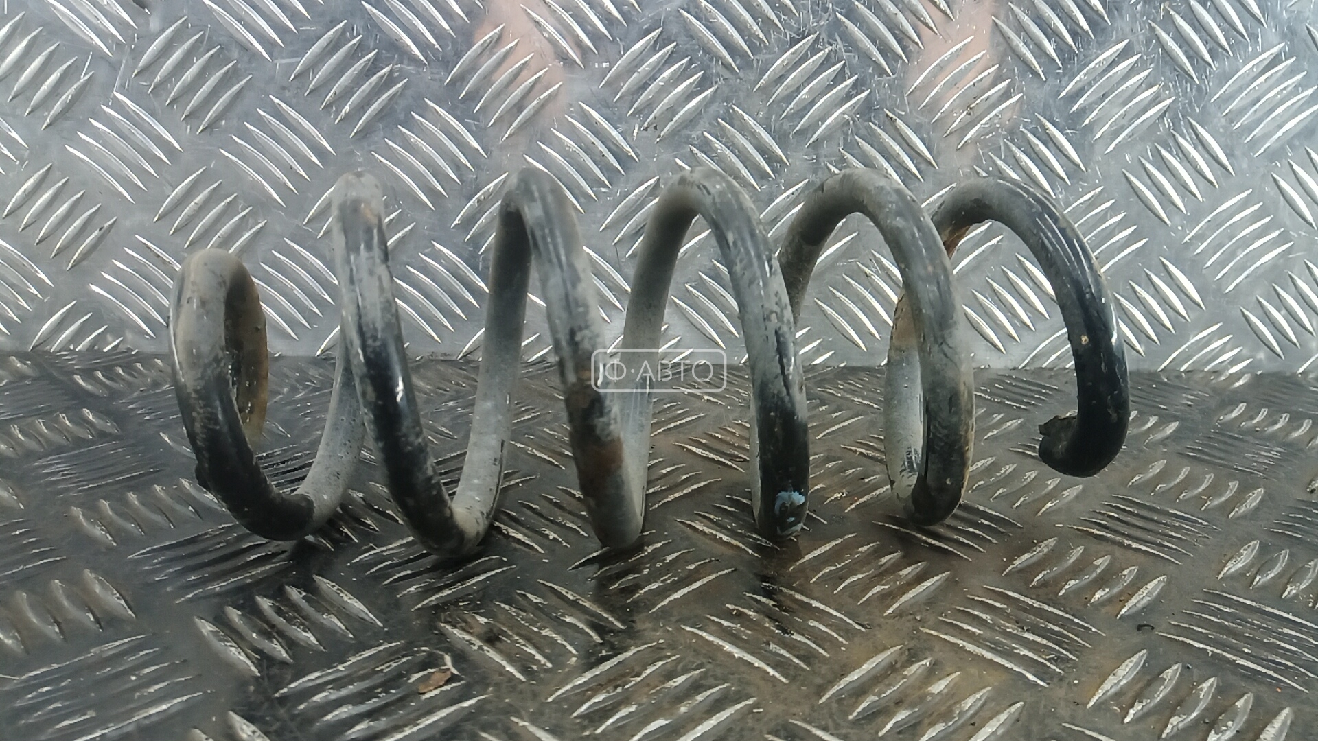 Пружина задняя