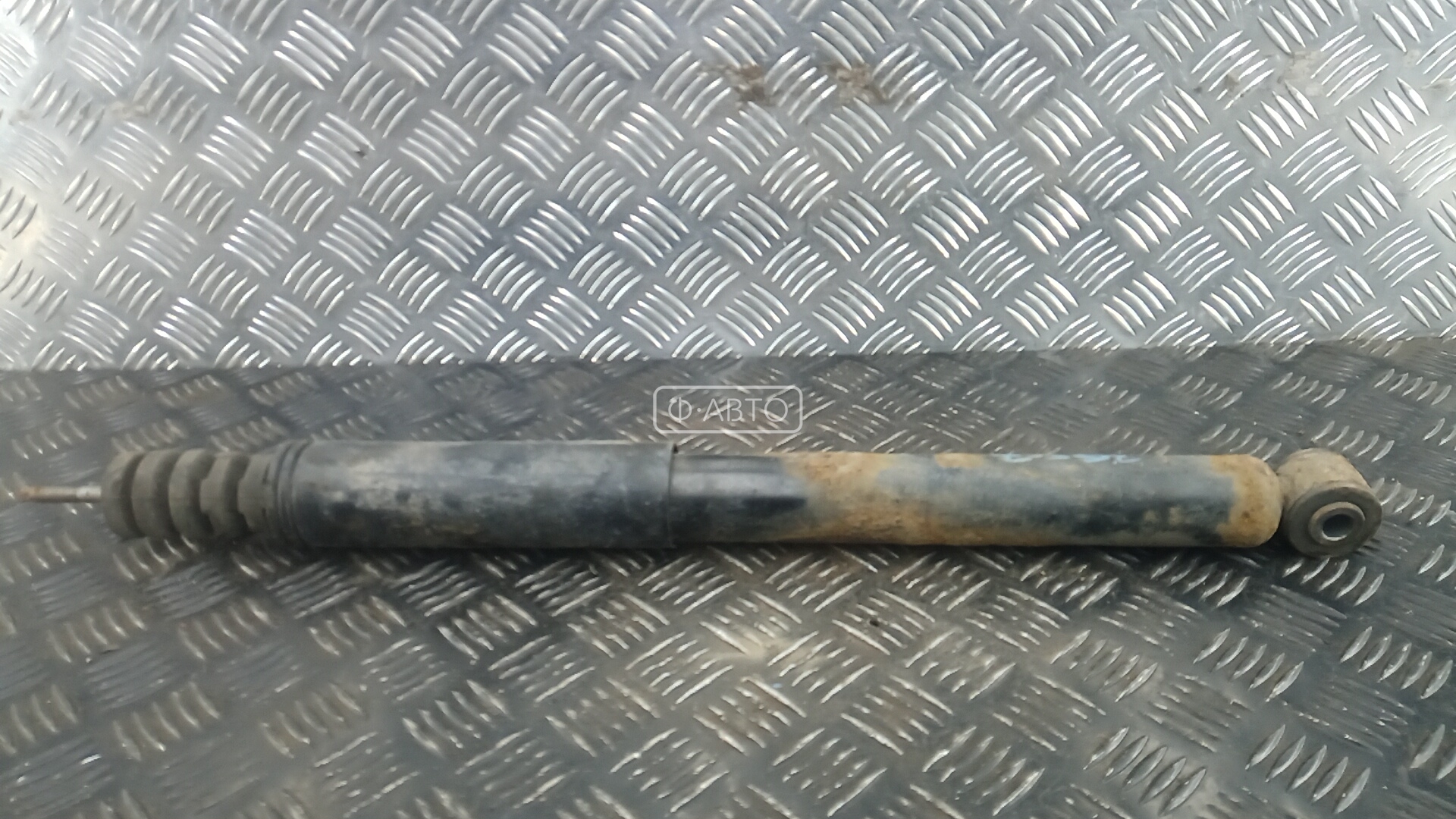 Амортизатор задней балки