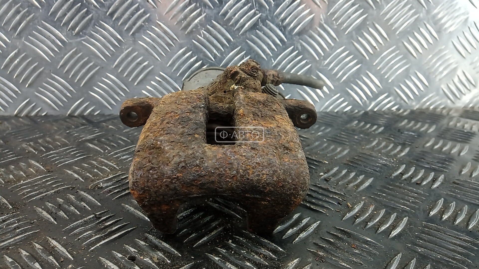 Суппорт тормозной задний левый