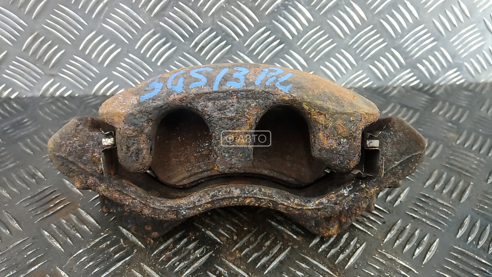 Суппорт тормозной передний левый