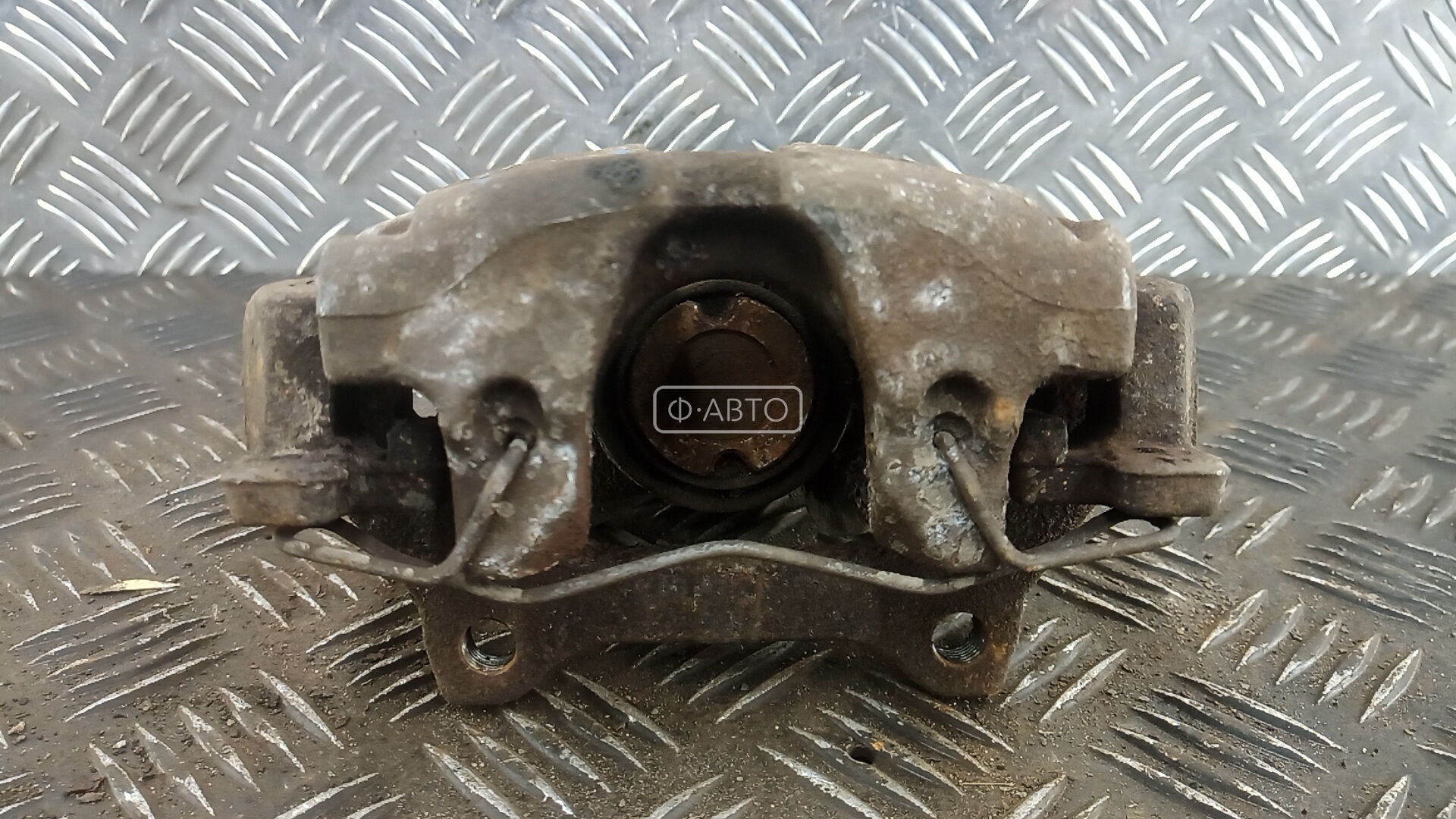Суппорт тормозной задний левый