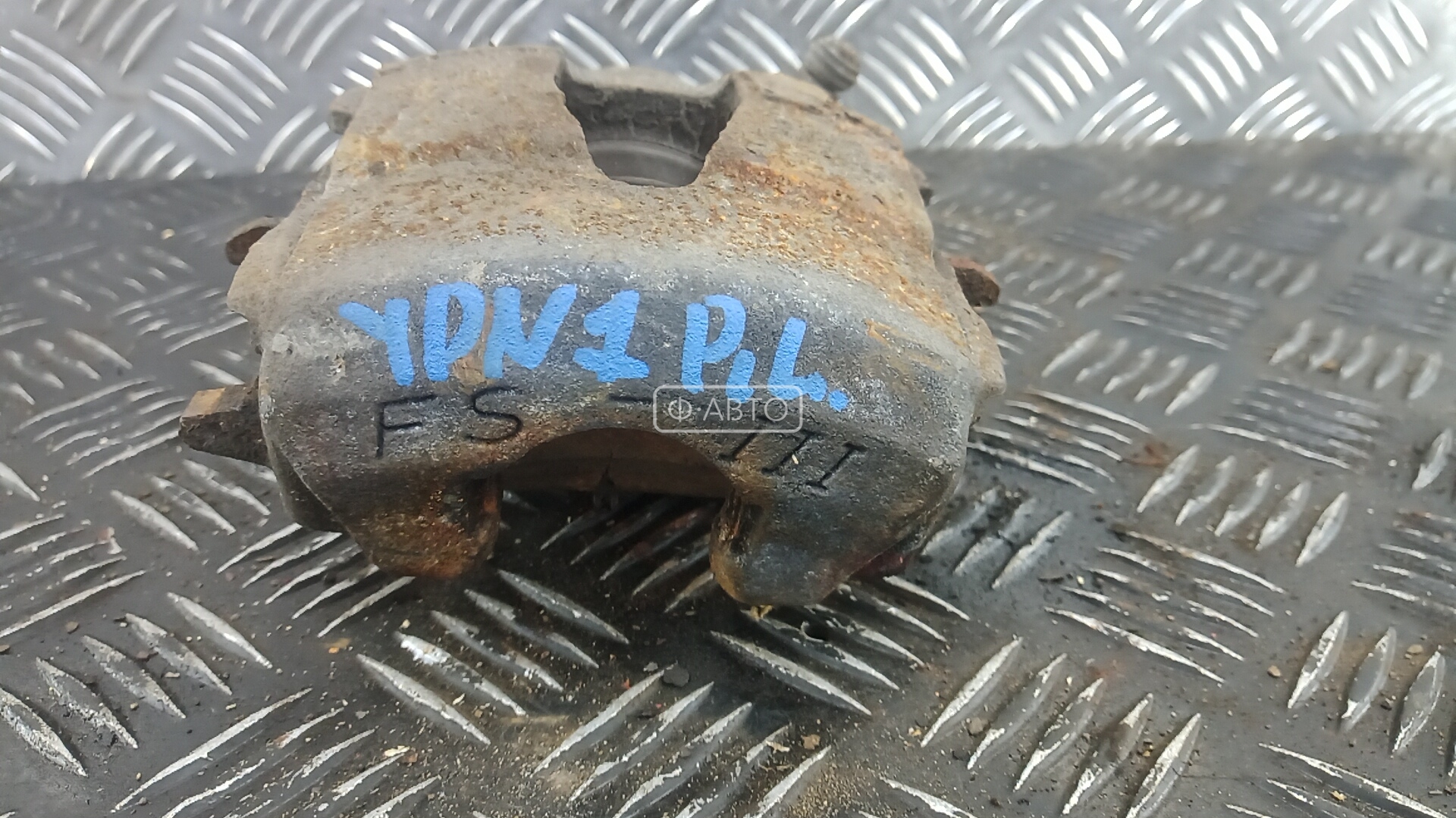 Суппорт тормозной передний левый