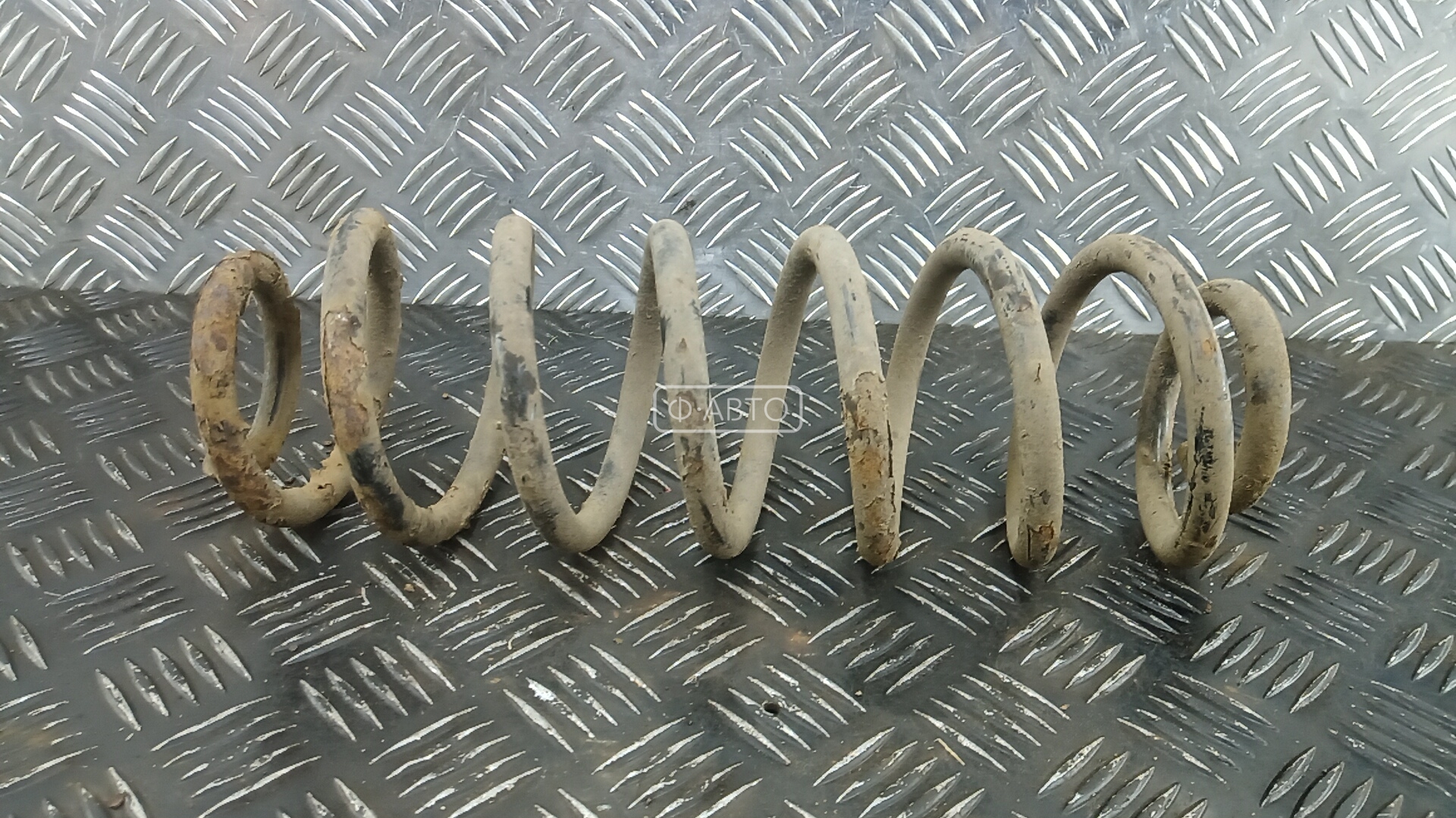 Пружина задняя