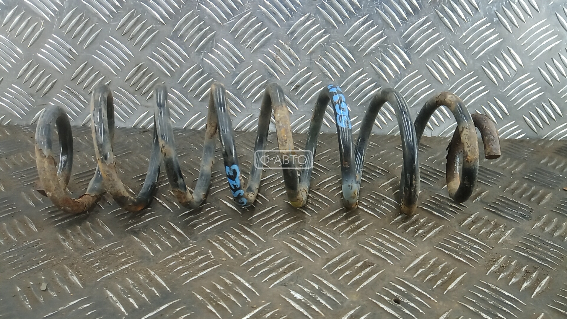 Пружина задняя