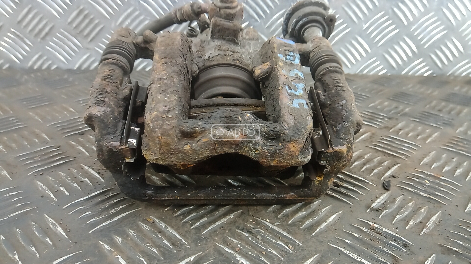 Суппорт тормозной задний левый