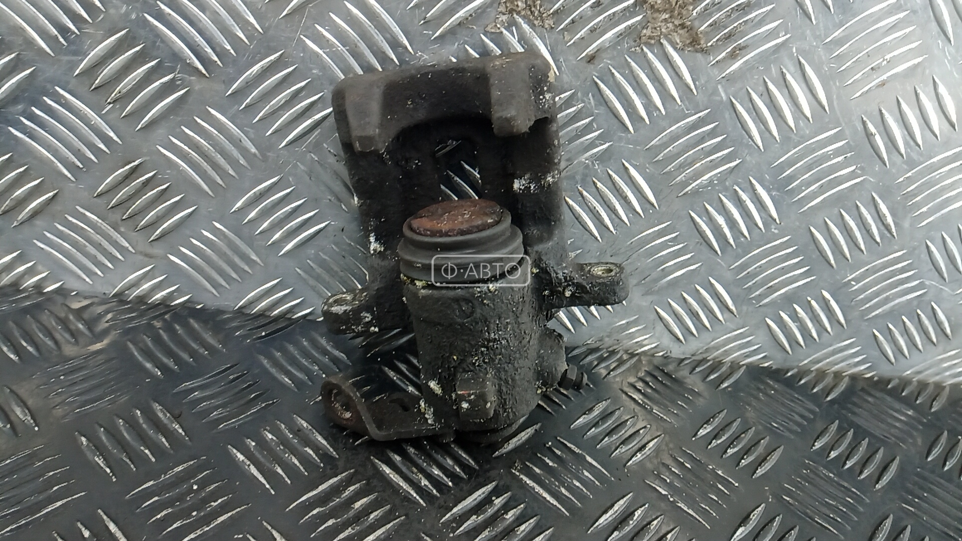 Суппорт тормозной задний правый