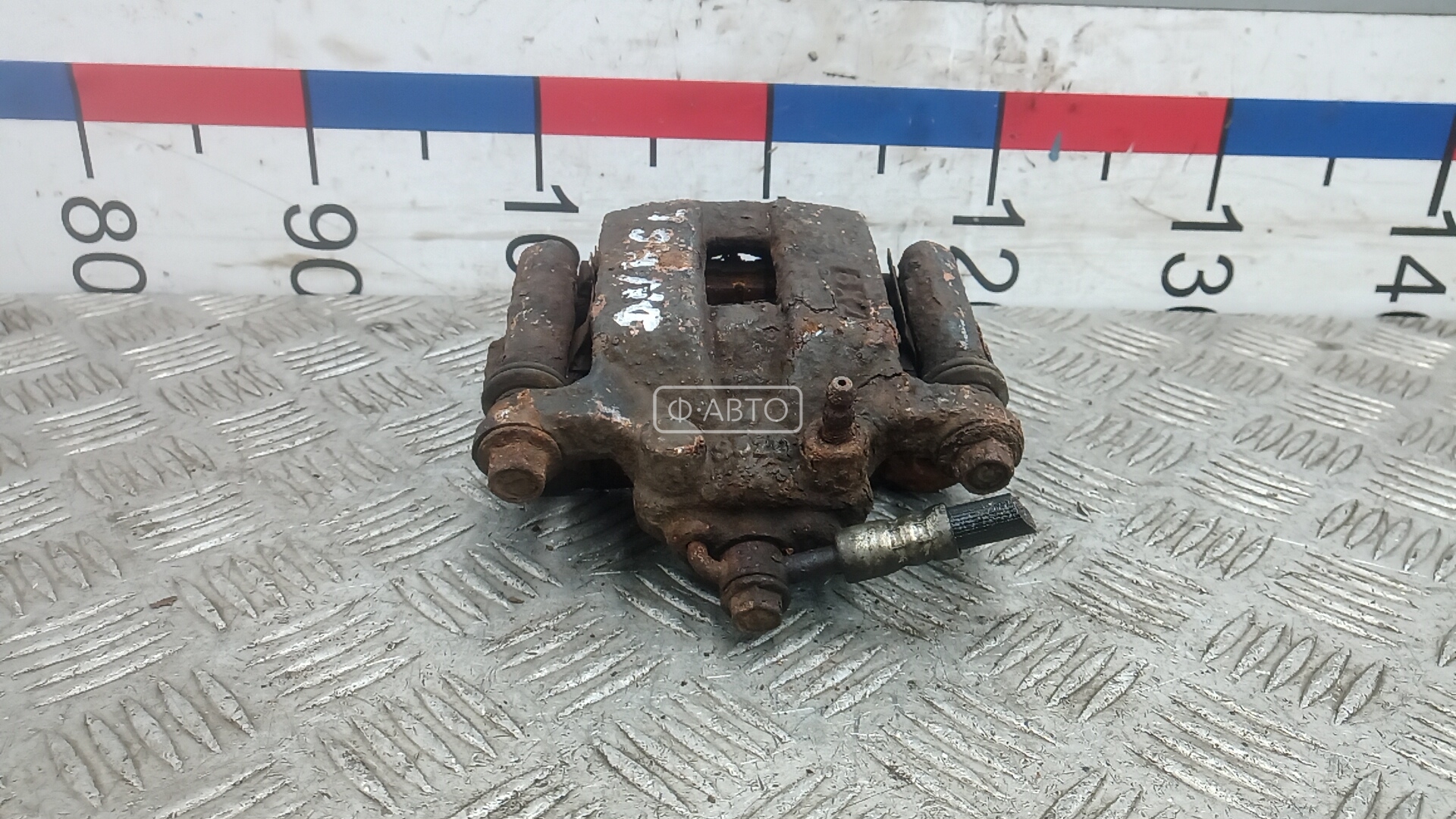 Суппорт тормозной задний левый