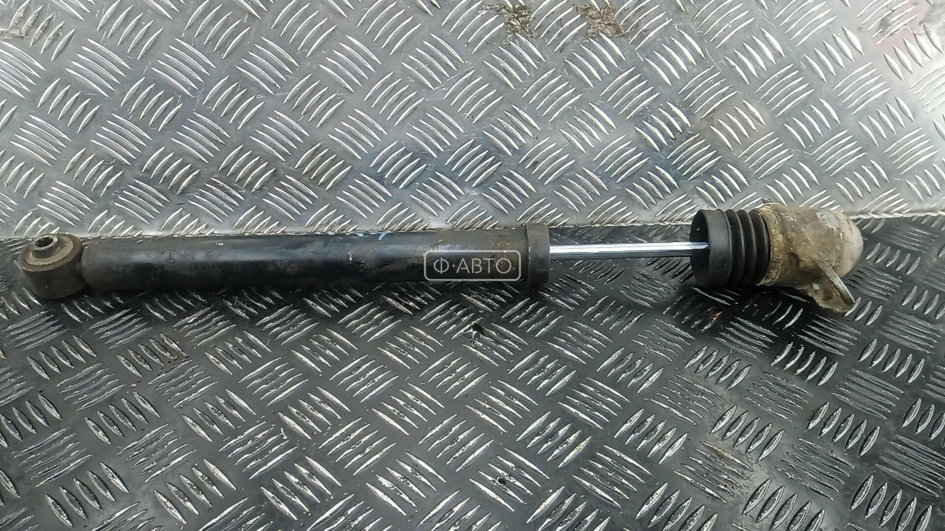 Амортизатор задней балки