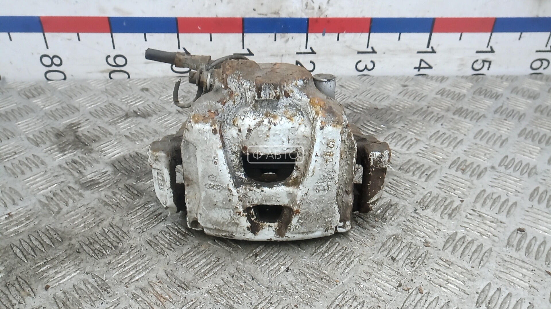 Суппорт тормозной передний левый