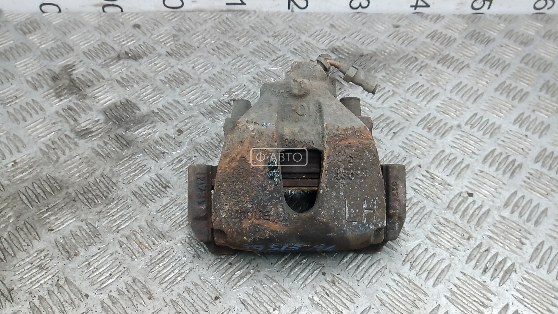 Суппорт тормозной передний левый