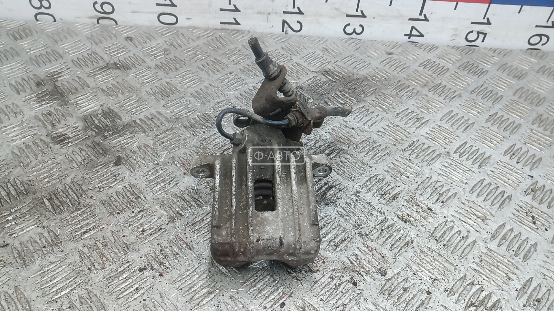 Суппорт тормозной задний левый