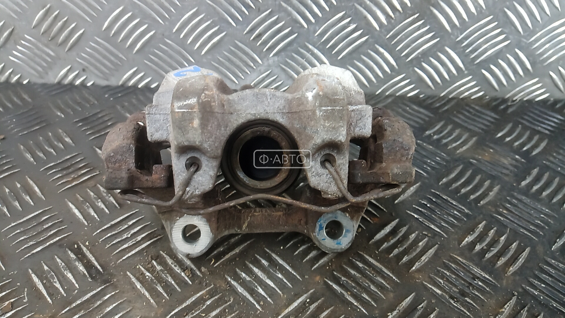 Суппорт тормозной задний левый