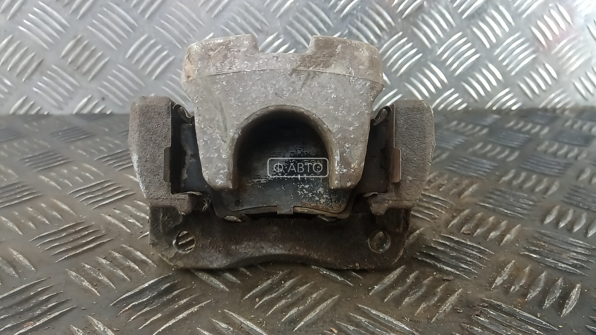 Суппорт тормозной задний левый