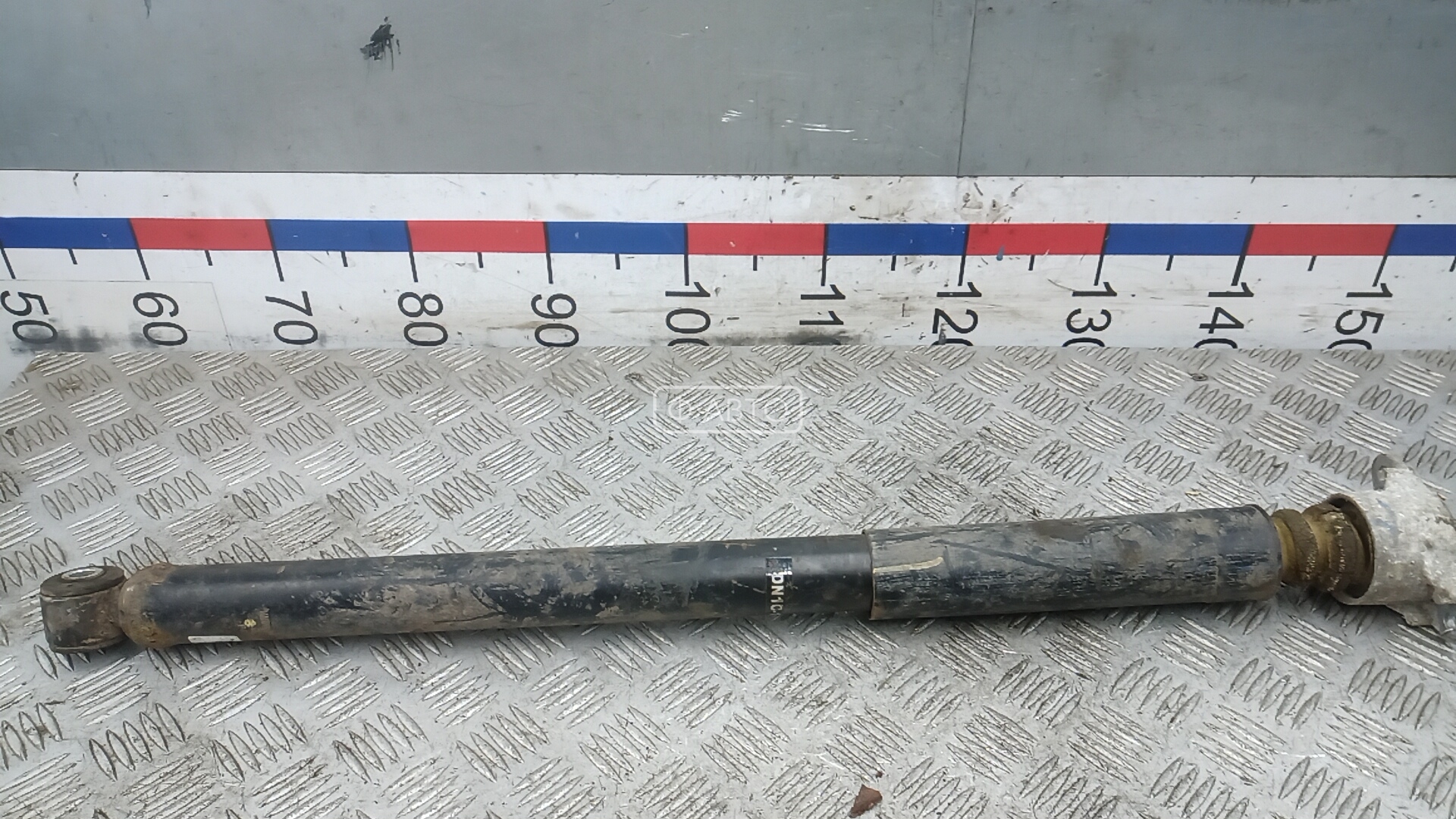 Амортизатор задней балки