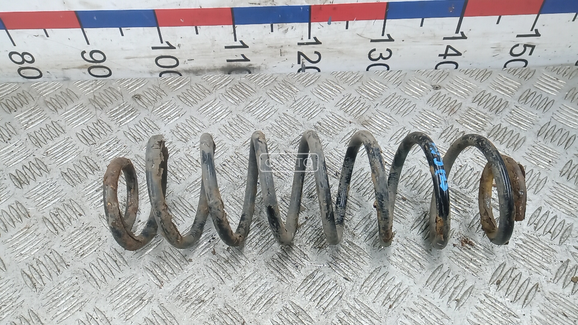 Пружина задняя