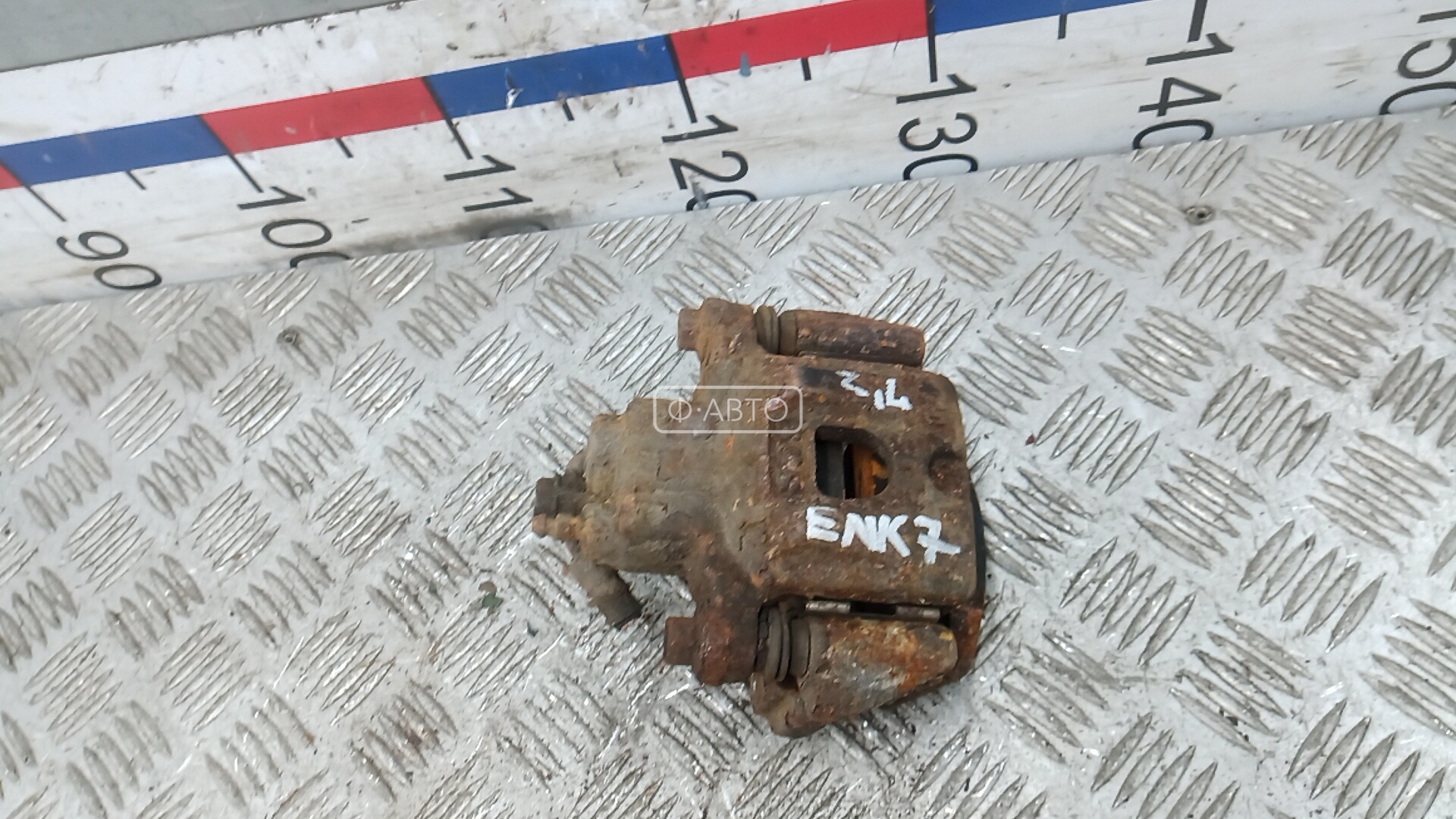 Суппорт тормозной задний левый