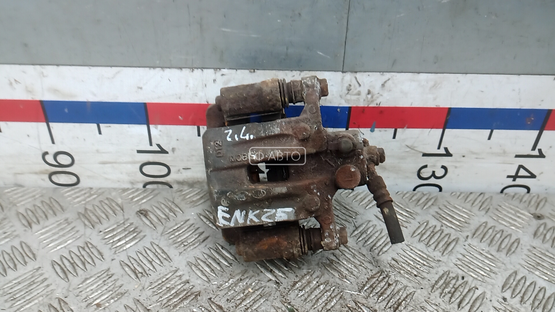 Суппорт тормозной задний левый