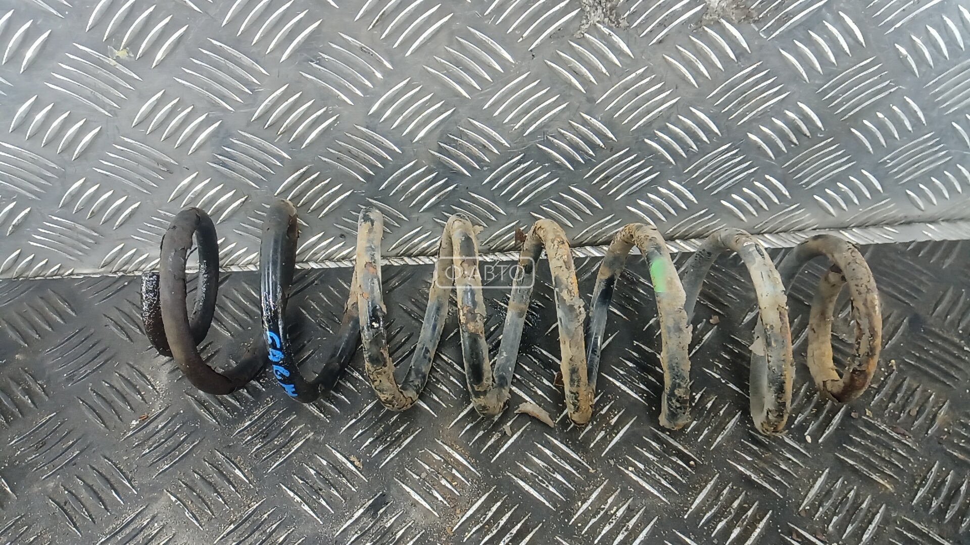 Пружина задняя