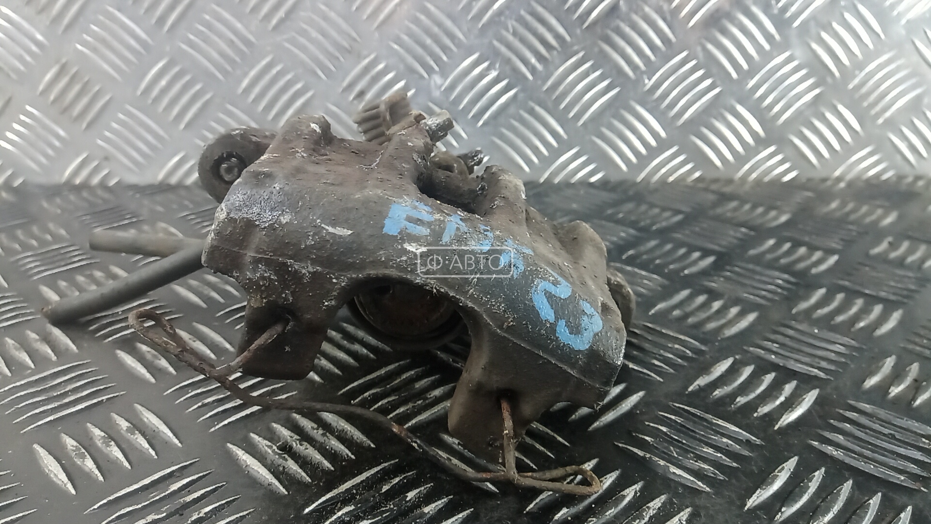 Суппорт тормозной задний левый