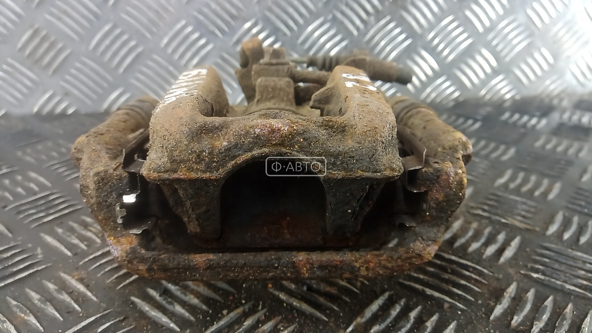 Суппорт тормозной задний левый