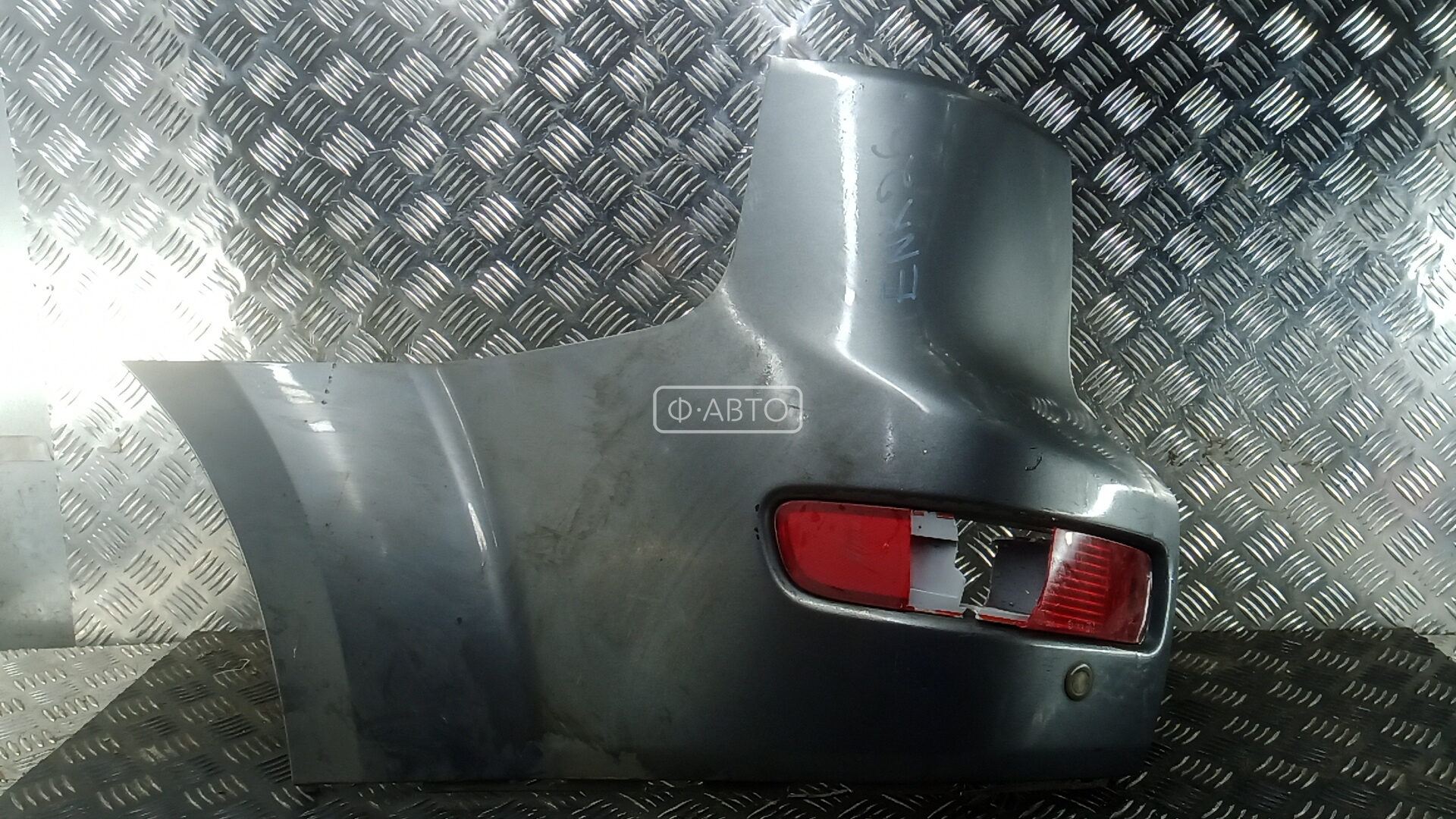 Клык бампера задний левый