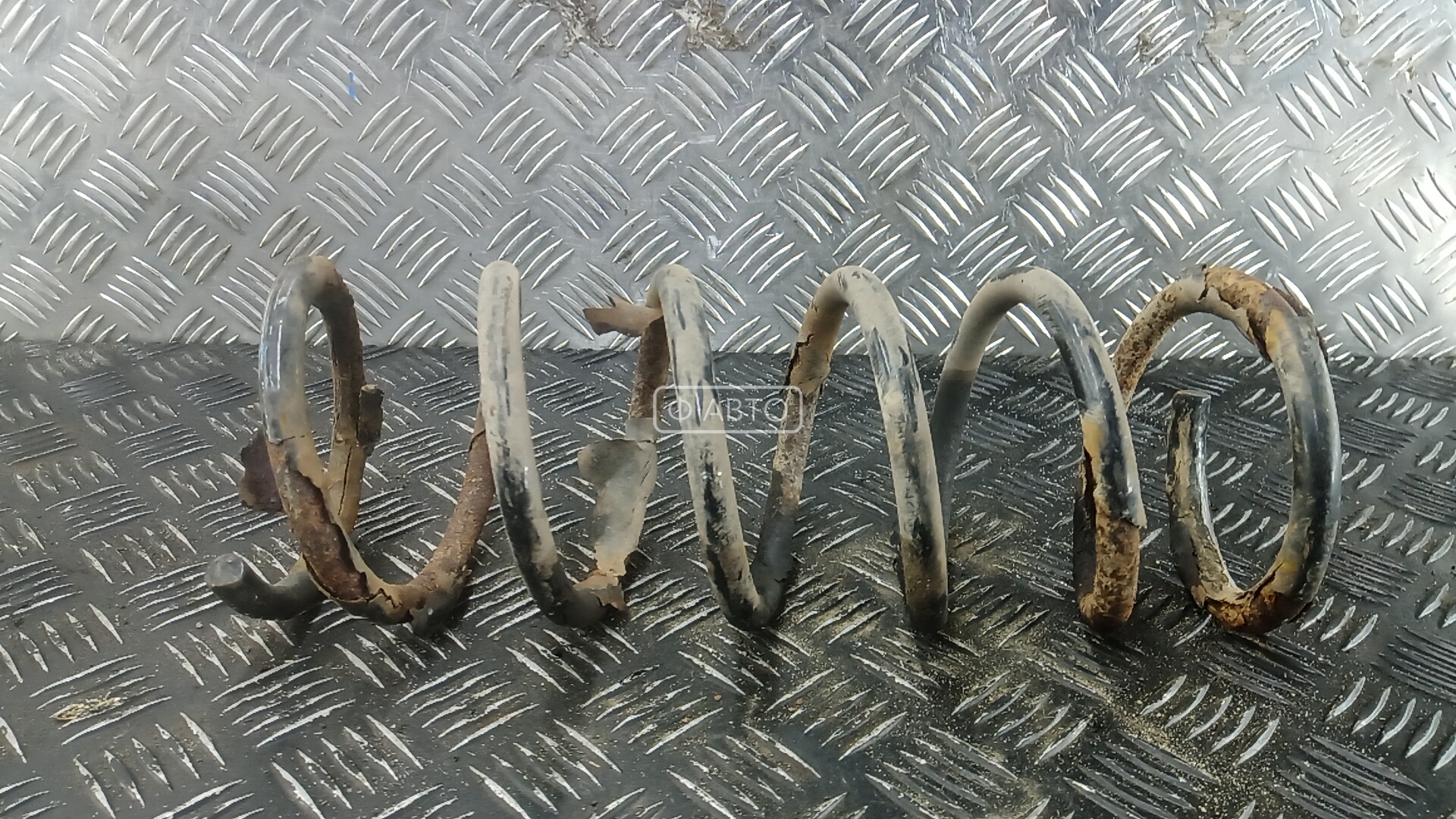 Пружина задняя