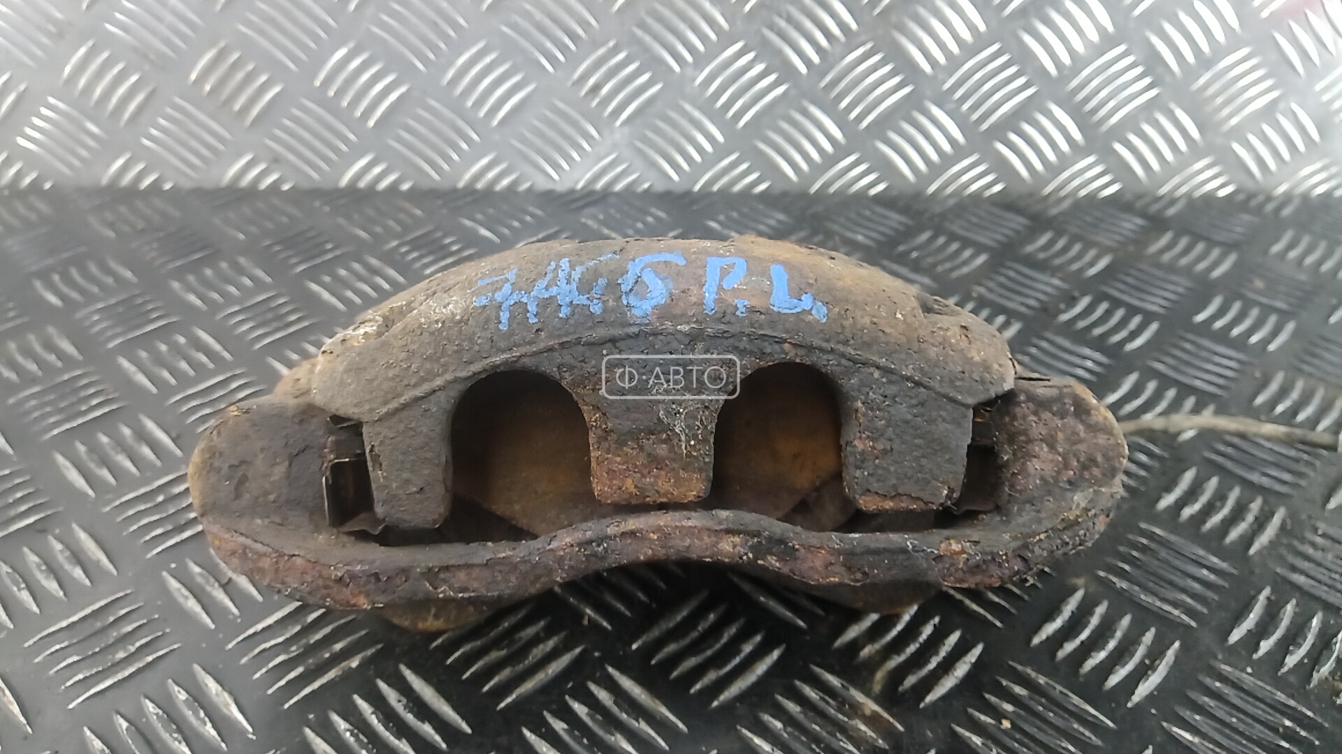 Суппорт тормозной передний левый