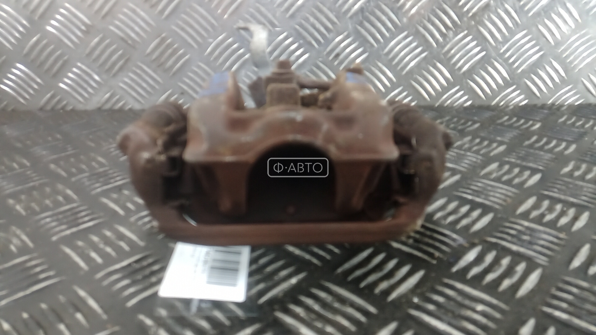 Суппорт тормозной задний левый