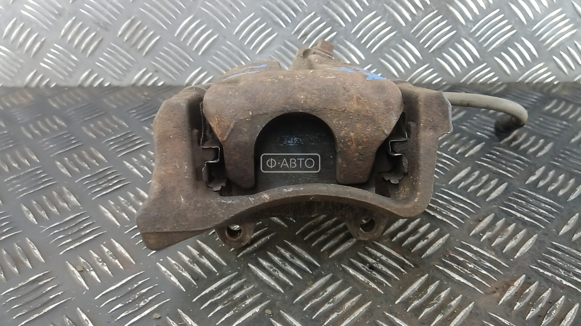 Суппорт тормозной задний левый