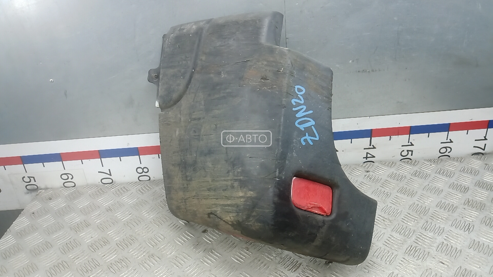 Клык бампера задний левый