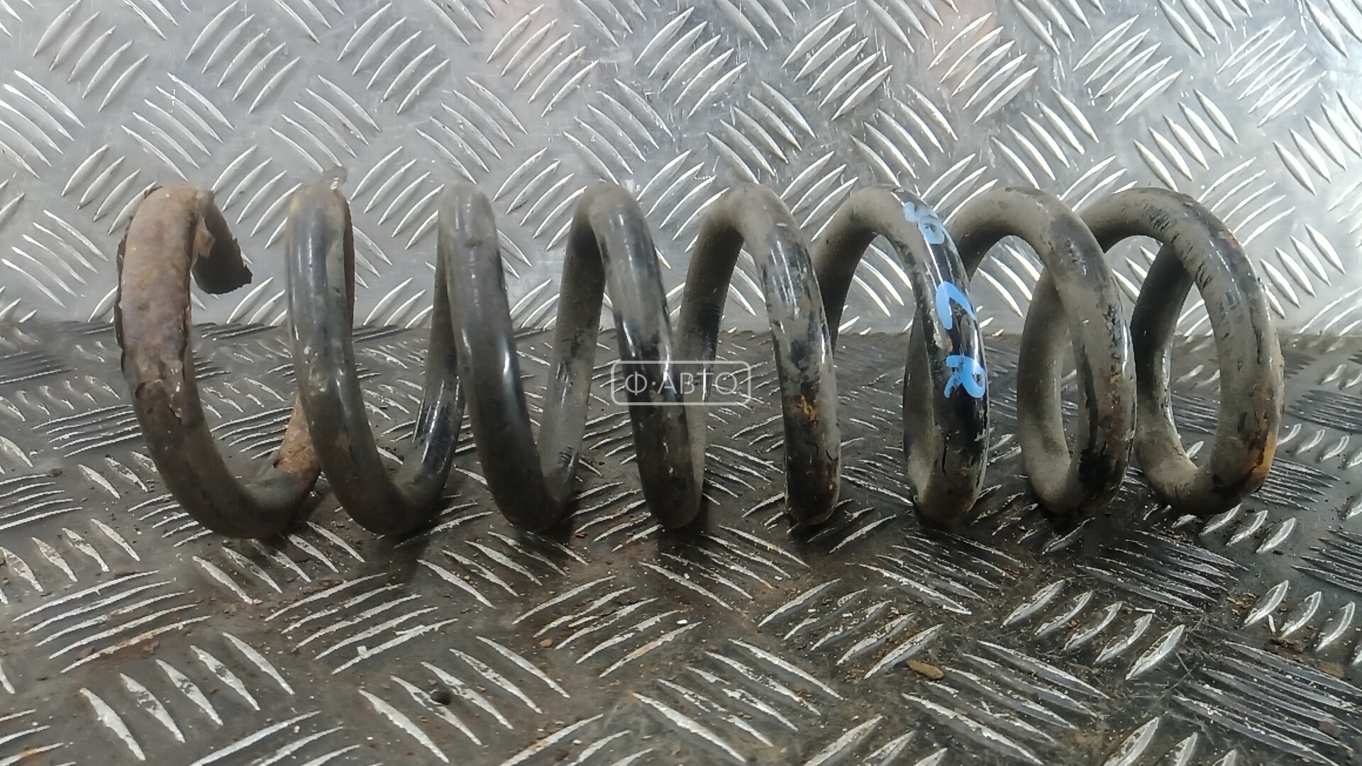 Пружина задняя