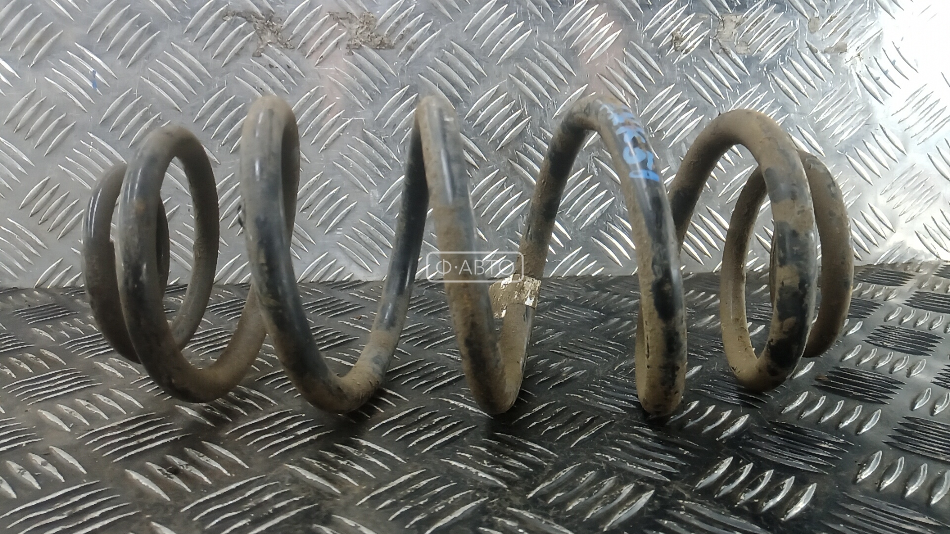 Пружина задняя