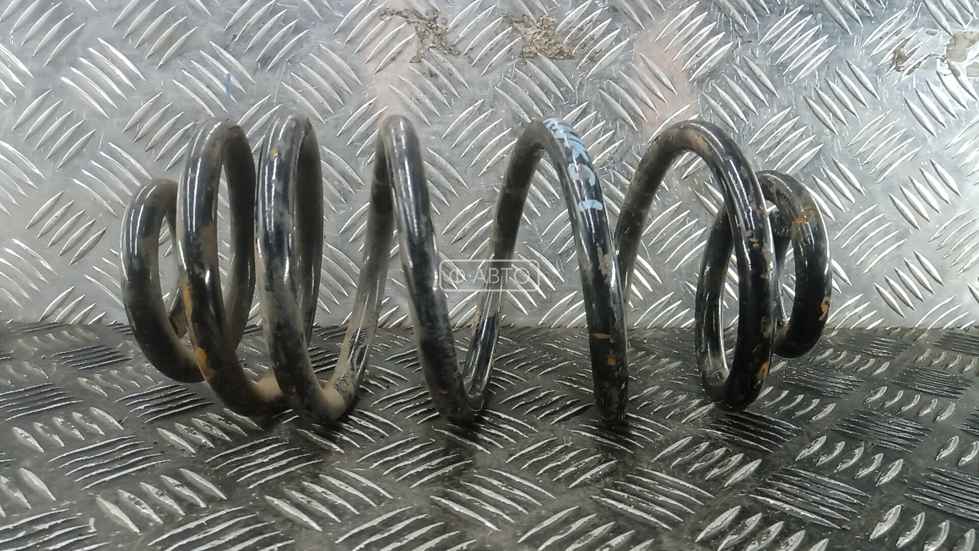 Пружина задняя