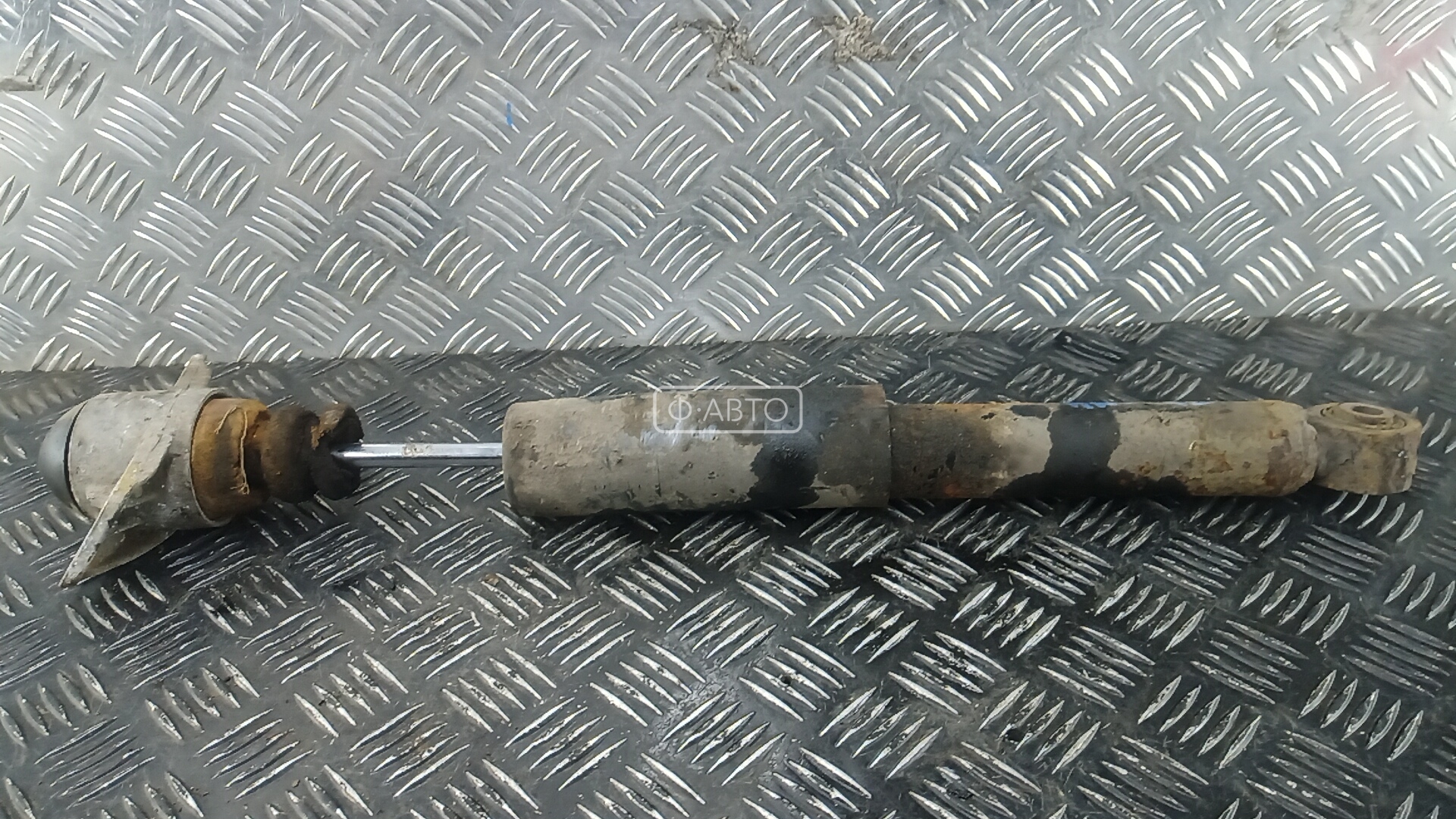 Амортизатор задней балки