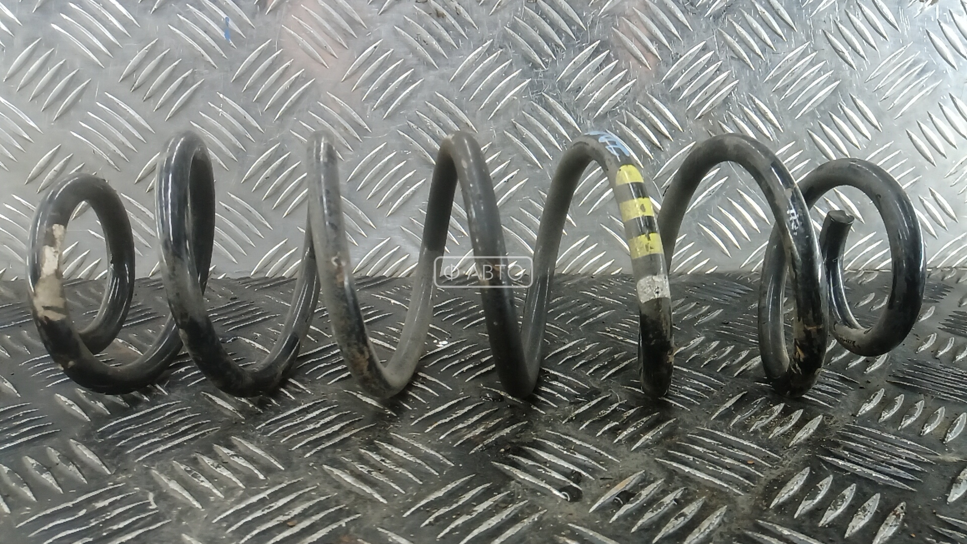 Пружина задняя