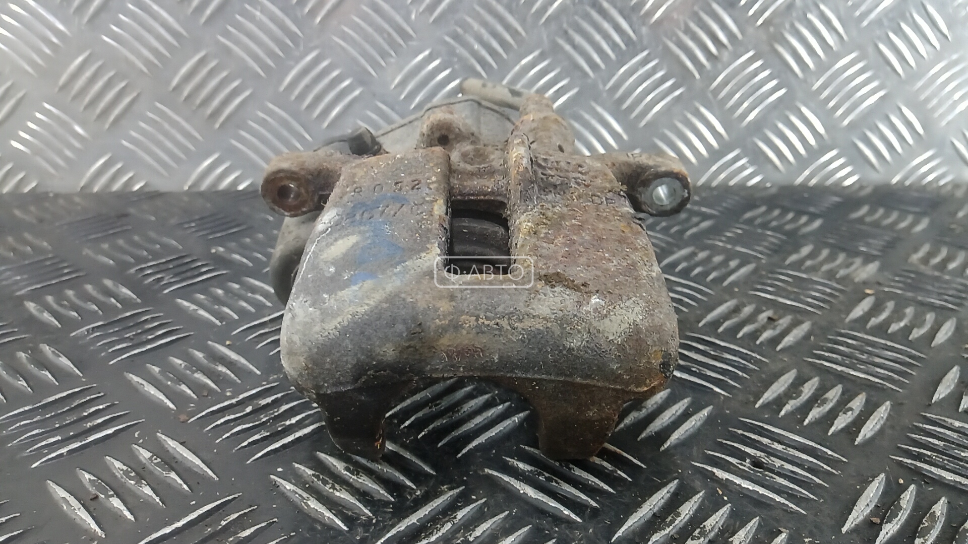 Суппорт тормозной задний левый