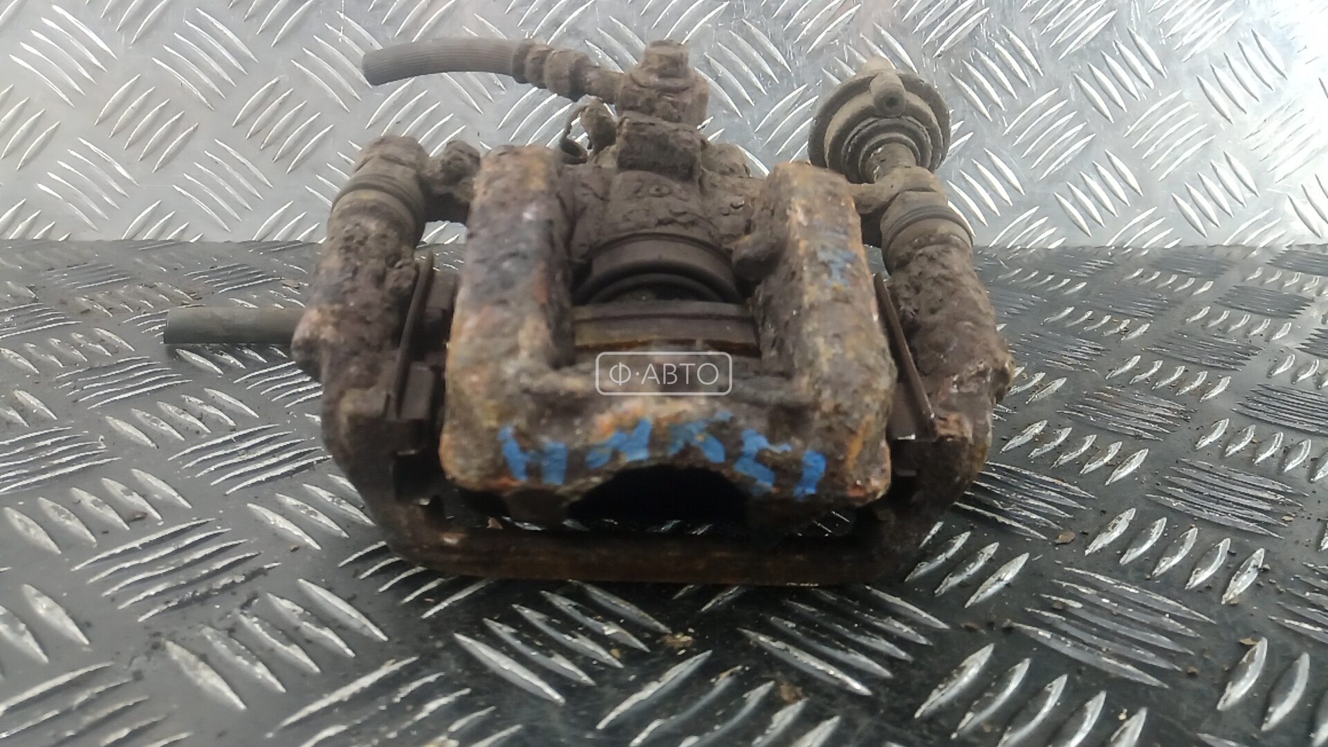 Суппорт тормозной задний левый