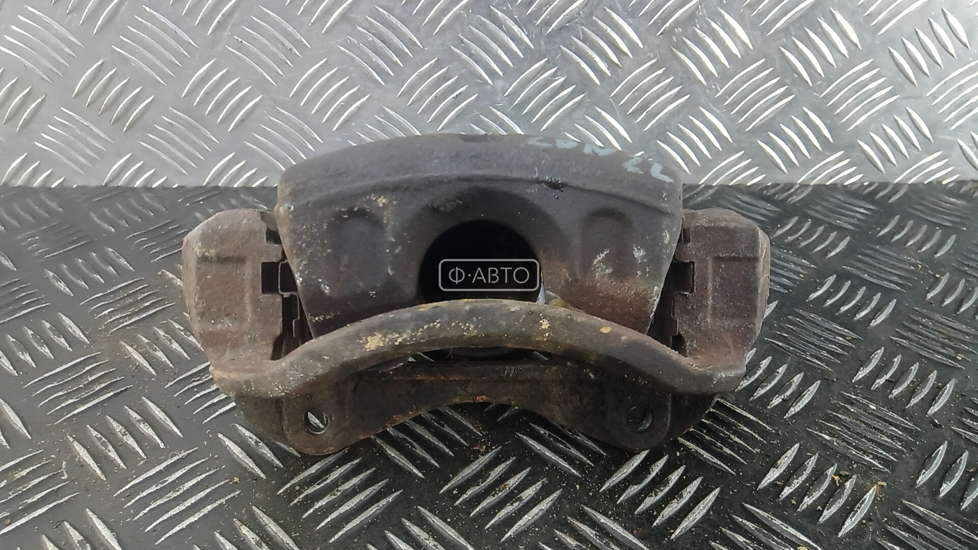Суппорт тормозной передний левый