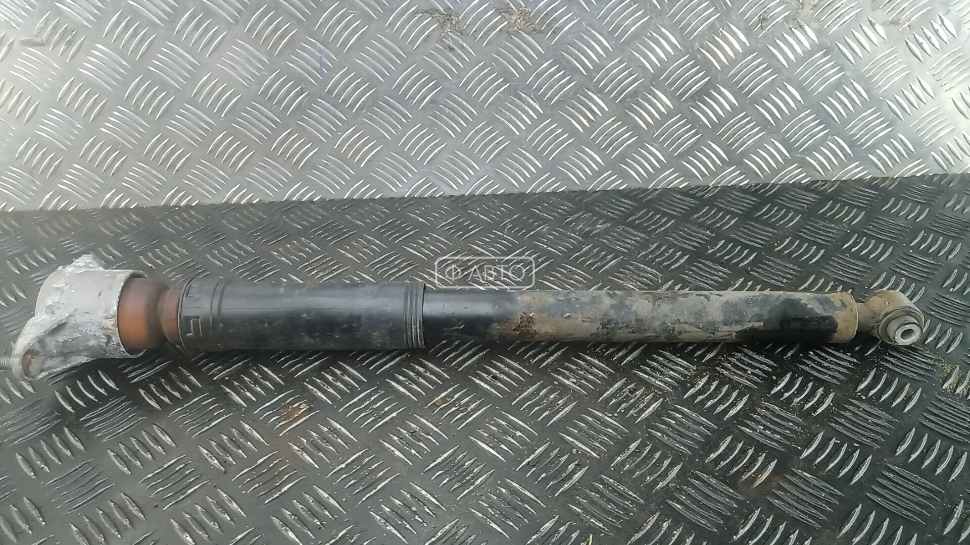 Амортизатор задней балки