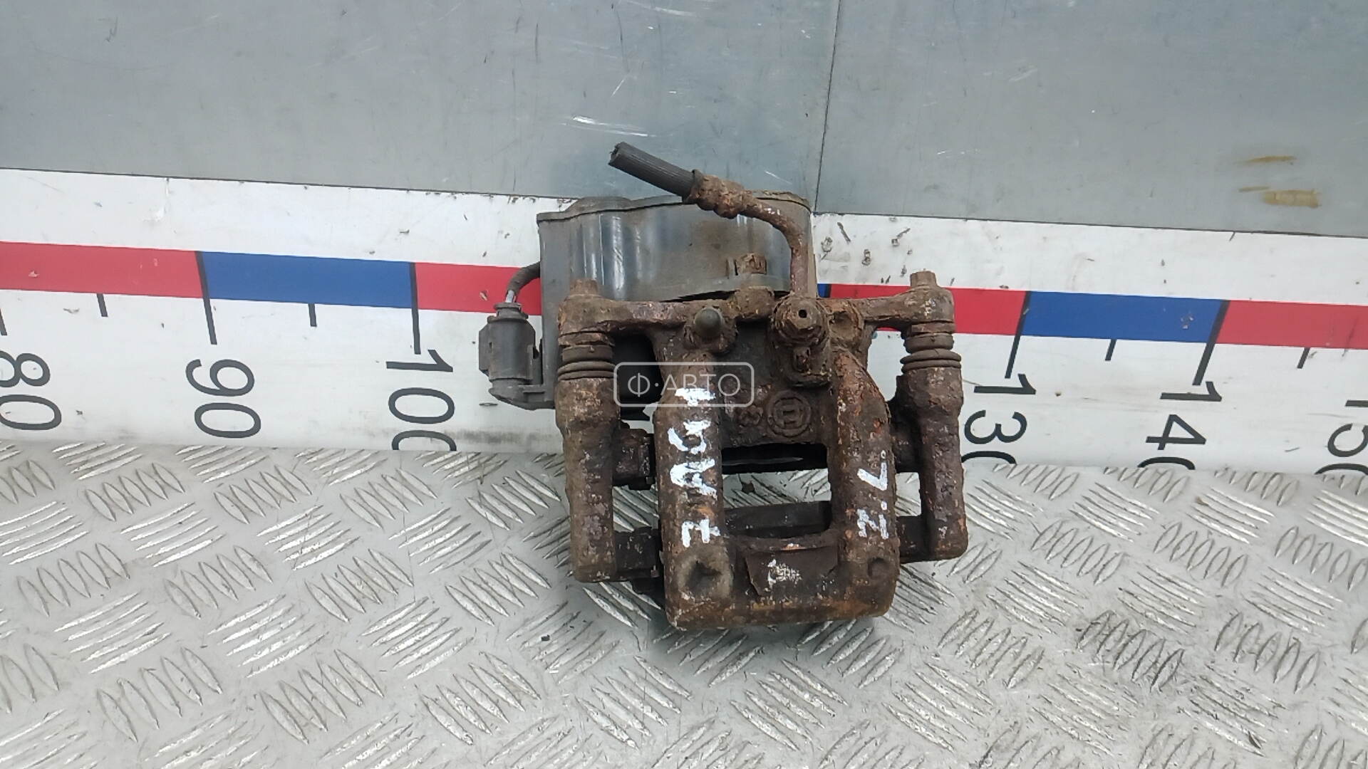 Суппорт тормозной задний левый