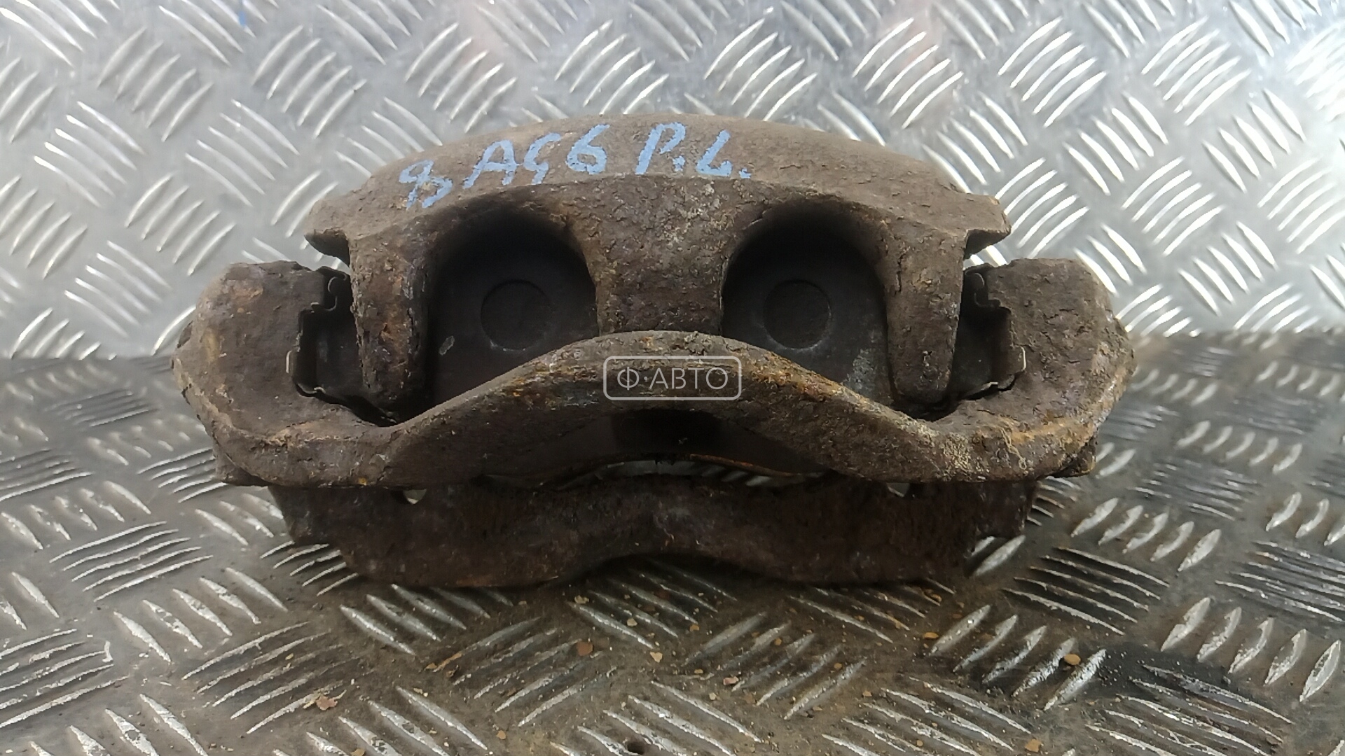 Суппорт тормозной передний левый