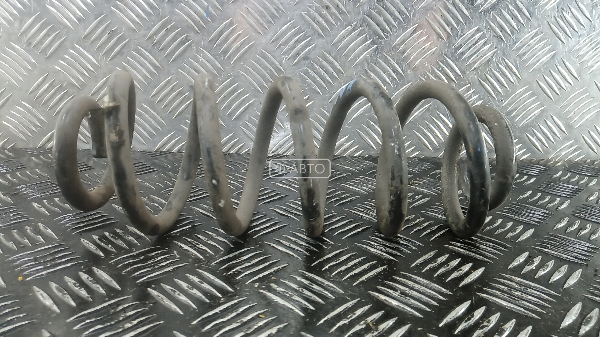 Пружина задняя