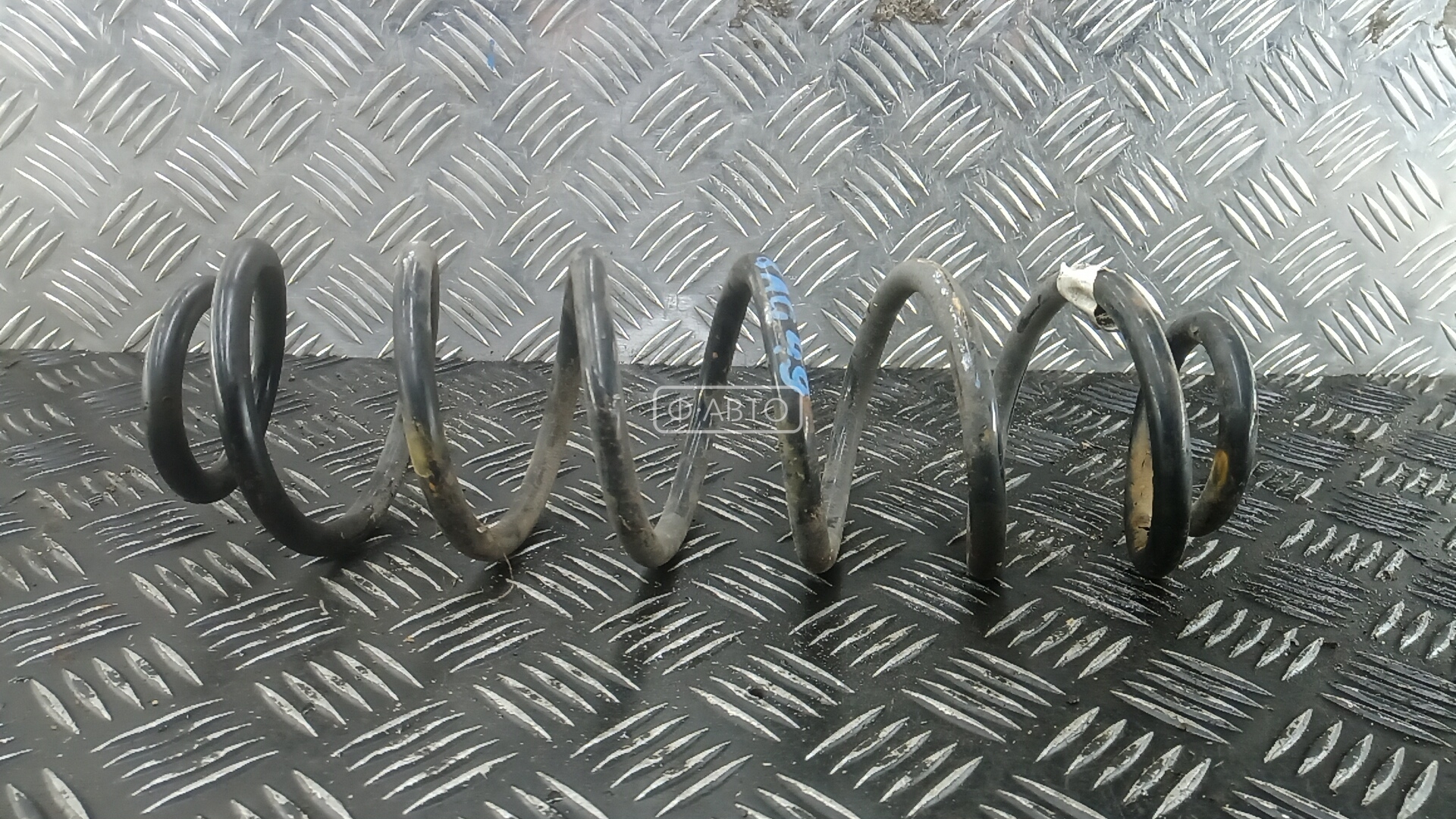 Пружина задняя